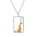 Gold and silver pendant with a dog pendant